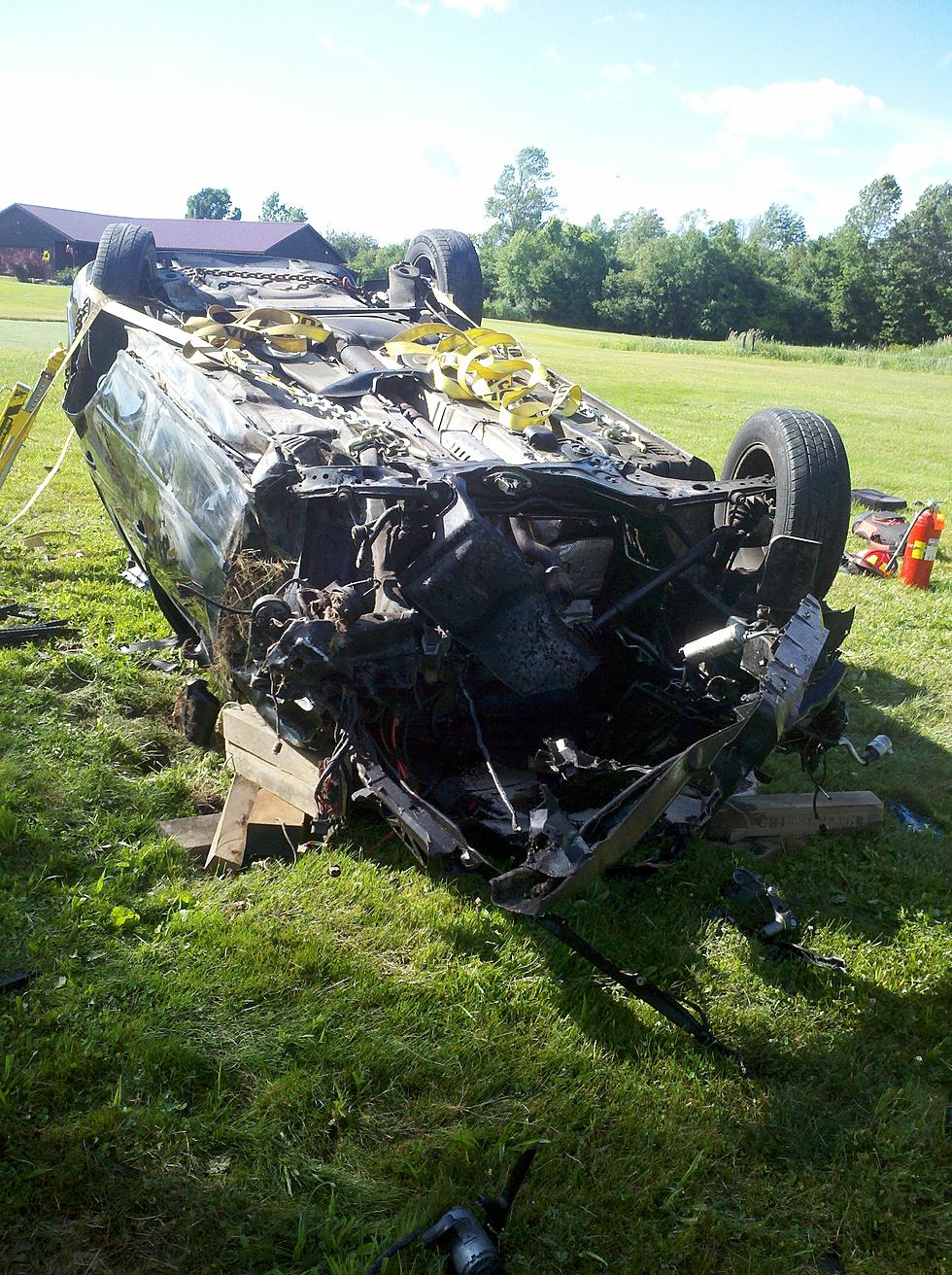 Accident Leaves Driver OK, Car A Mangled Mess