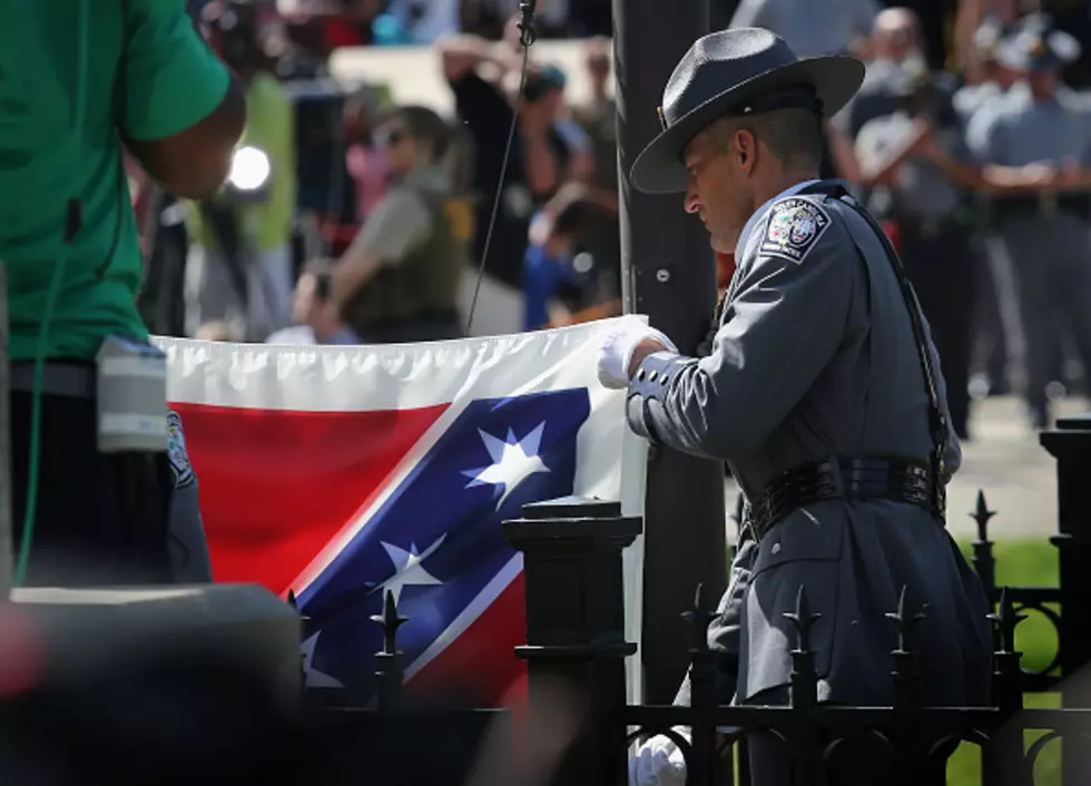 Confederate Flag Lowered At South Carolina State Capitol