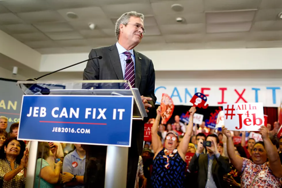 Bush Takes Revamped Campaign, Slogan to Early Primary States