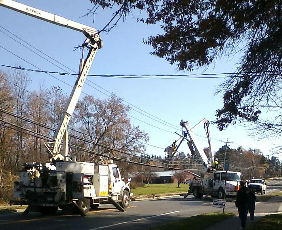 Downed Wire Being Repaired at Redeemer Church Polling Site in Utica