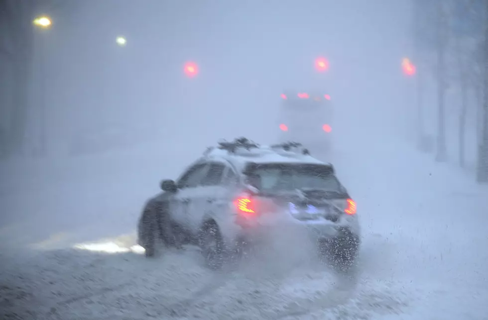 New York Governor Helps Motorist Struck In Snow During Storm