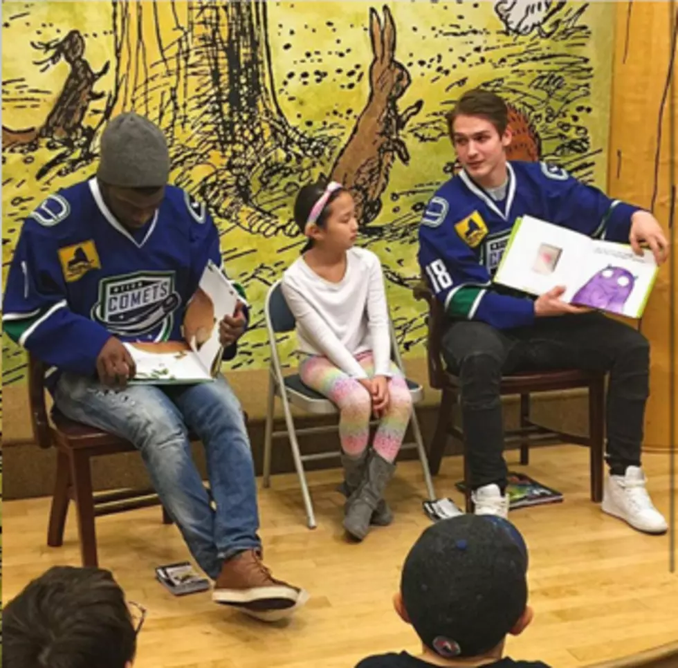 Comets Take Time for Storytime with Local Children