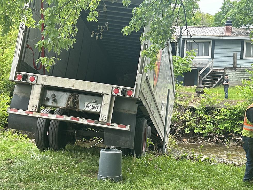 Tractor Trailer Barrels By House, Crashes In Upstate NY Creek