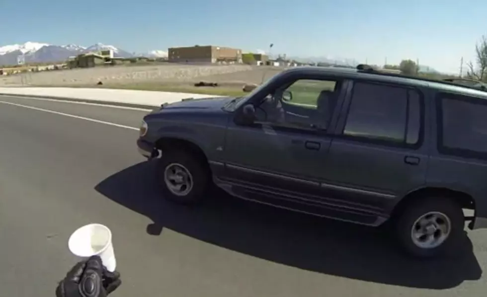 Motorcyclist, &#8216;Bossaucey&#8217; Saves Coffee Cup From Moving Car&#8217;s Bumper