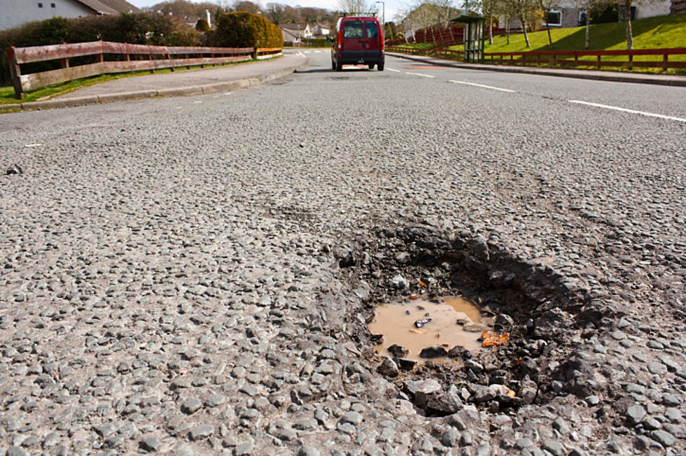 Ticket For 'Dodging Potholes'