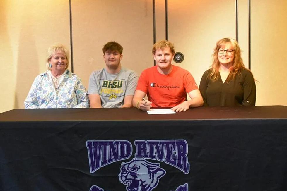Wylie Shearer of Wind River Signs with Dakota State-Bottineau