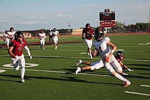 Photofest! Powell Outlasts Riverton in Week Zero Football