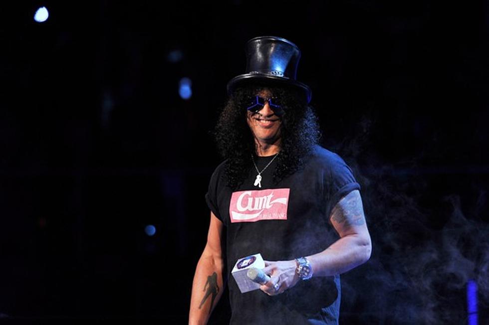 Slash Auctioning Off Car, Guitars, And More