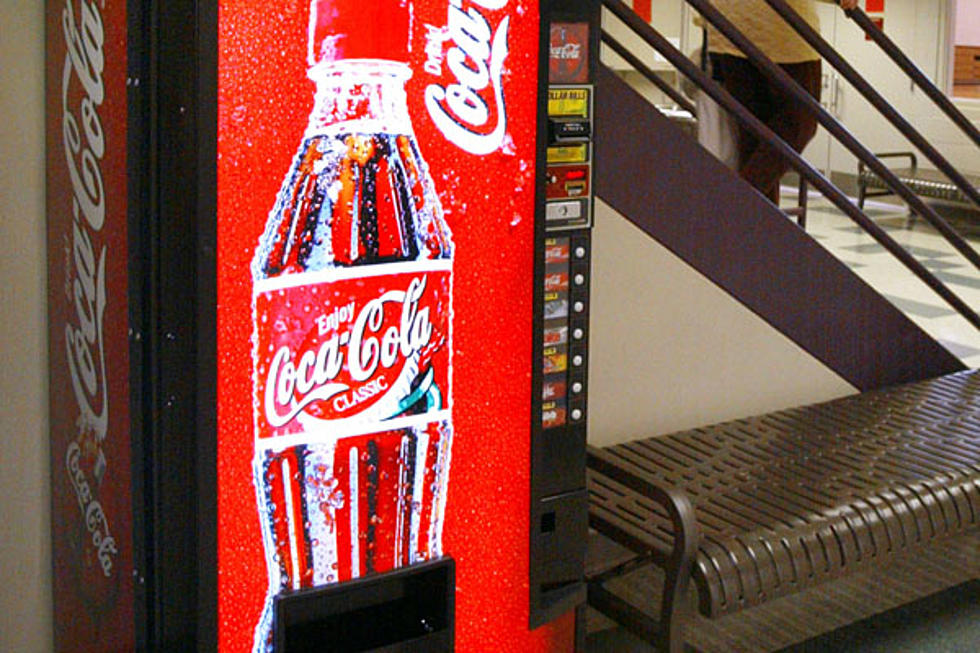 Police Say Man Was Touching Self by Soda Machine