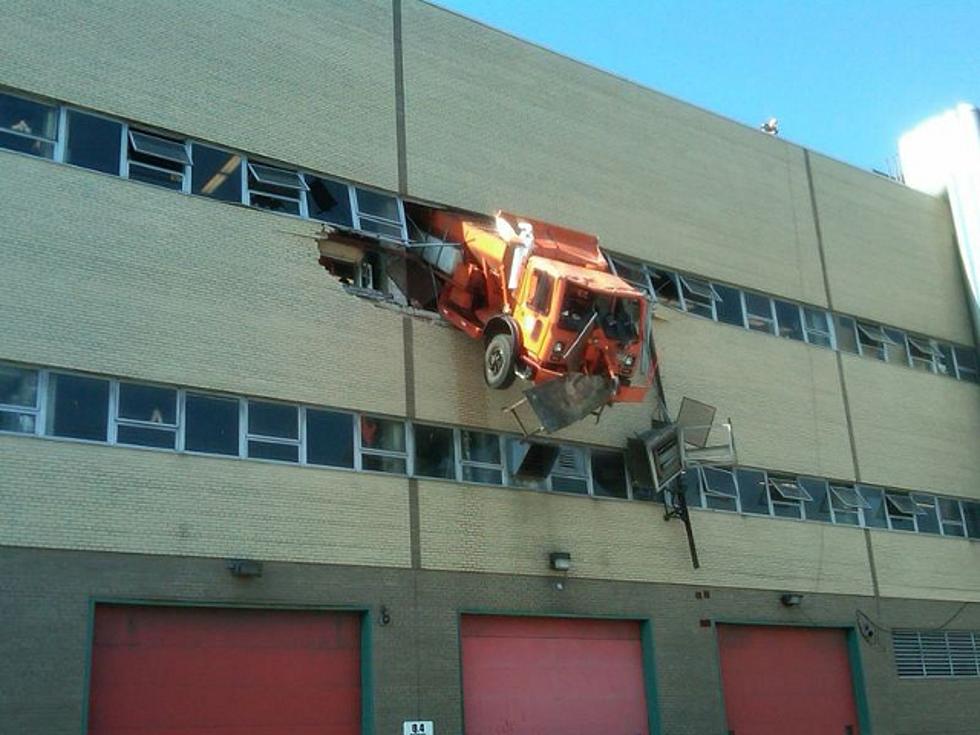 Driver Miraculously Rescued as Sanitation Truck Crashes Through Third Story of Building [VIDEO]