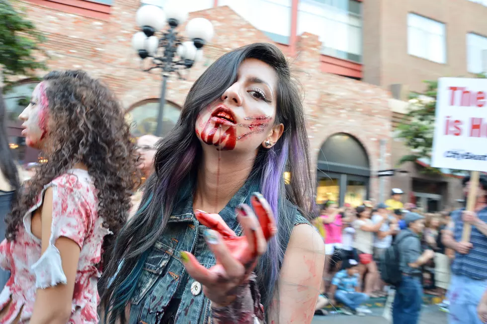 Car Runs Over Woman During Comic-Con Zombie Walk [Video]
