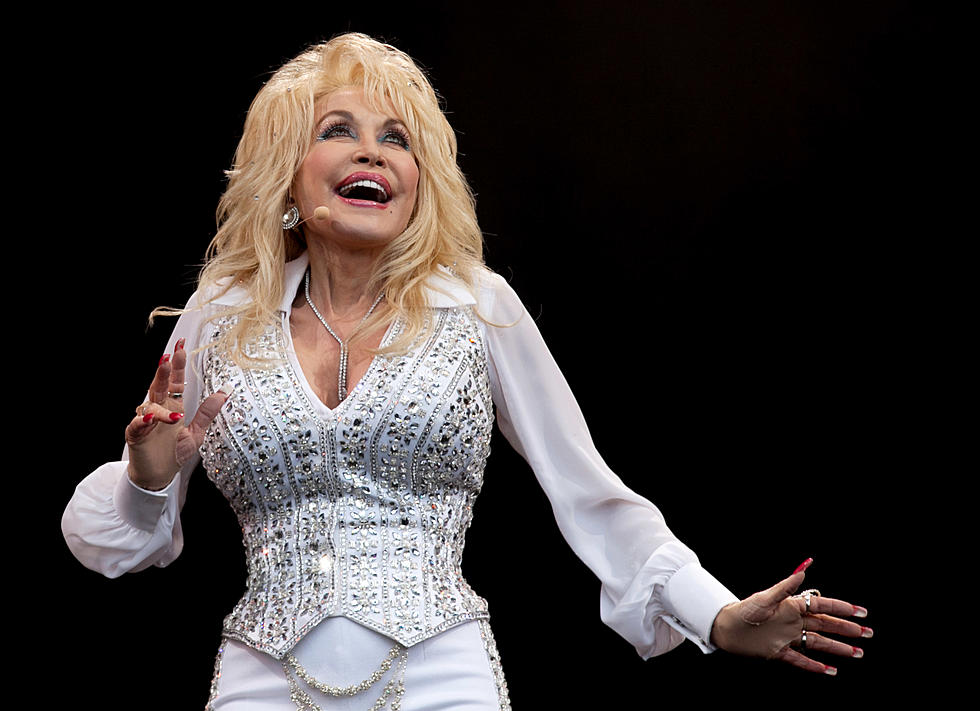 Free Beer &#038; Hot Wings: Dolly Parton Plays &#8216;Benny Hill&#8217; Theme On the Sax [Video]