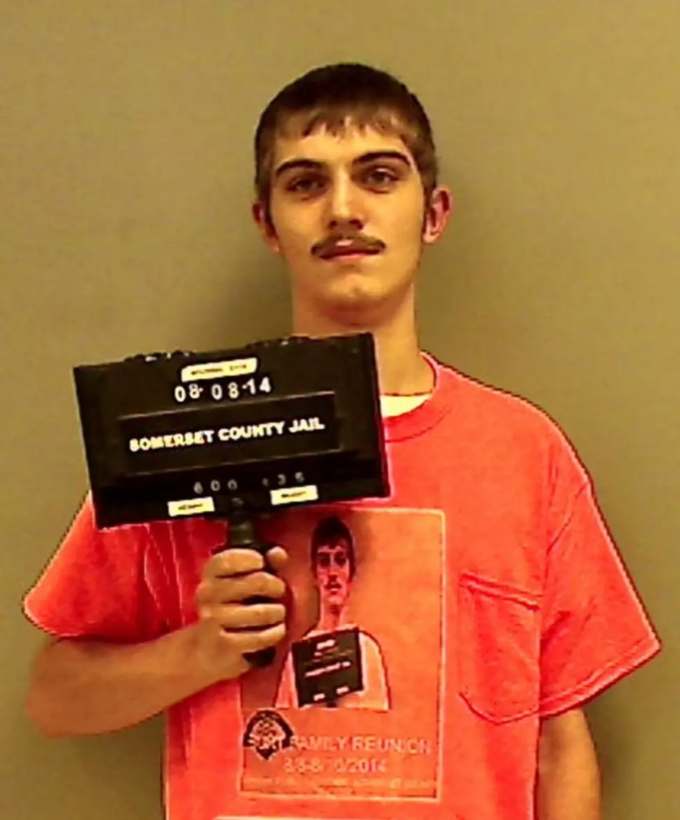 Free Beer & Hot Wings: Guy’s Mugshot Features Him Wearing Shirt With His Mugshot On It