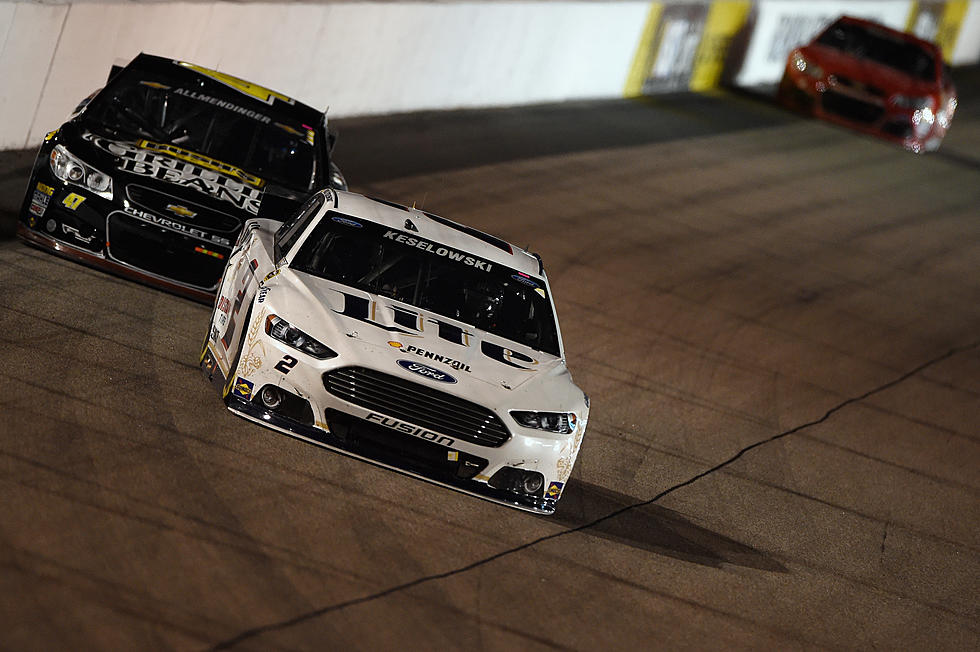 Free Beer &#038; Hot Wings: Idiot Fan Climbs Catch Fence During NASCAR Race [Video]