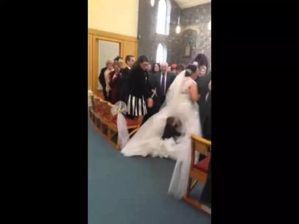 Watch This Kid Do His Best to Ruin a Wedding [Video]