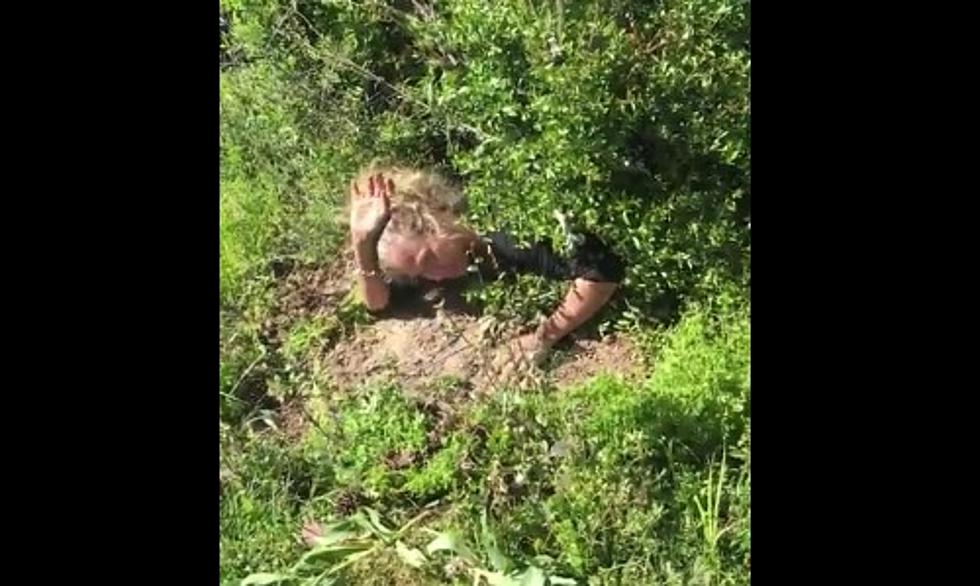 Crazy Woman Crawls Through Bushes Looking For a Driveshaft [Video]