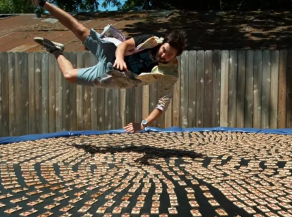 Man Jumps Onto A Trampoline Covered In 1,000 Mouse Traps