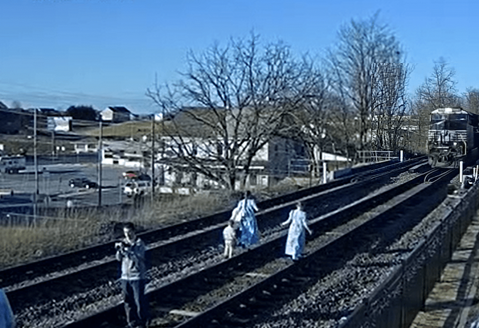 Family Risks Their Lives For “Perfect Photo” On Train Tracks