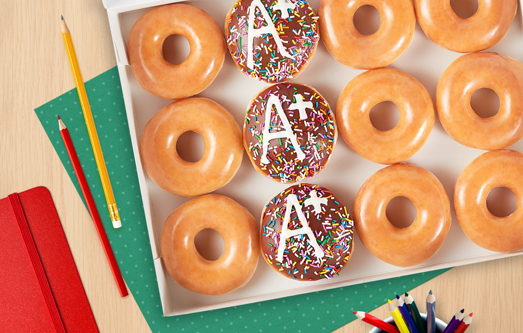 Get a Free Dozen Doughnuts at Krispy Kreme On Their Birthday