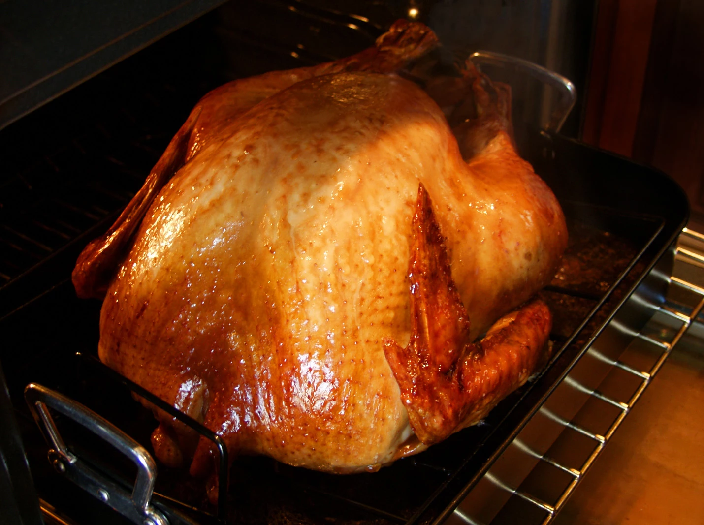 Pop up timers are notoriously inaccurate. Always check the internal te, turkey cooking