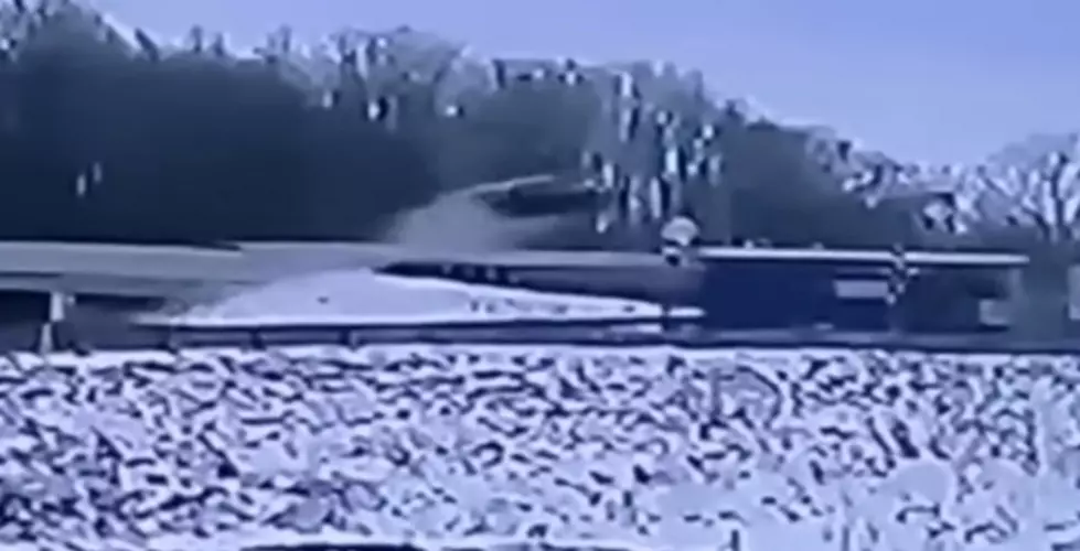 Car clears Highway Bridge! Dorr, Michigan - Video Screenshot