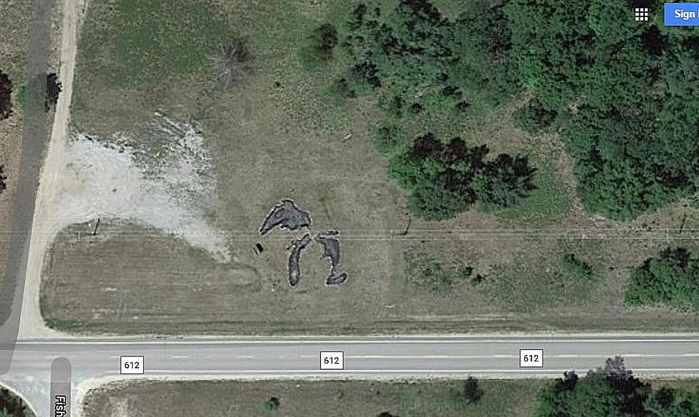 What’s the Deal with the Tiny Michigan Carved in the Earth Up North?