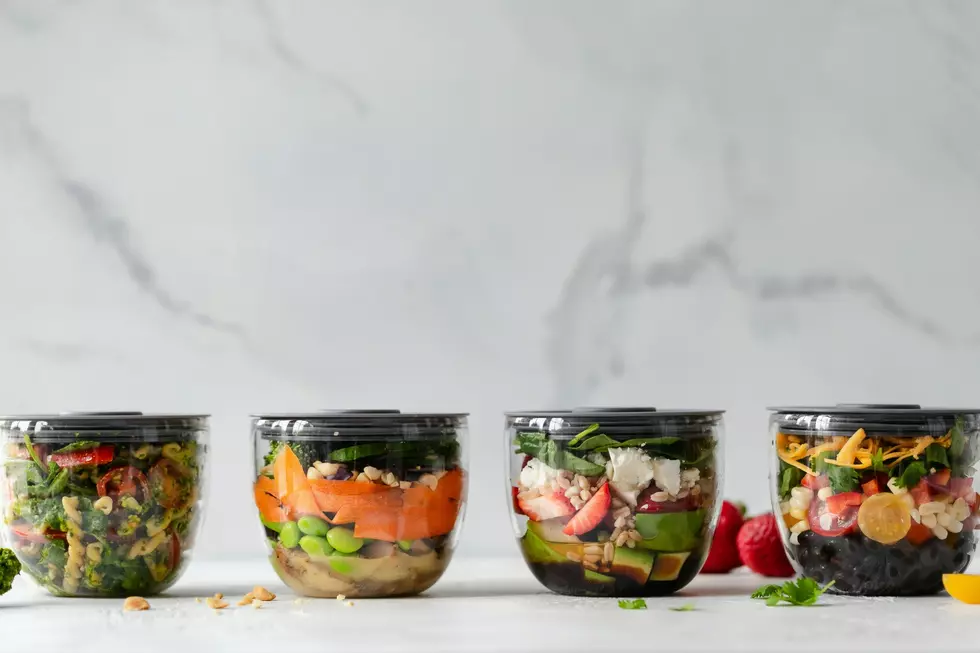 A display of four meal prepped dishes