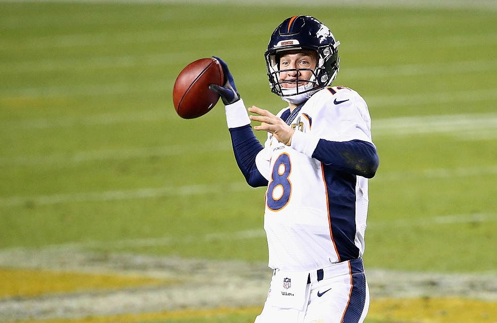 Manning pitched TDs, insurance with equal ease