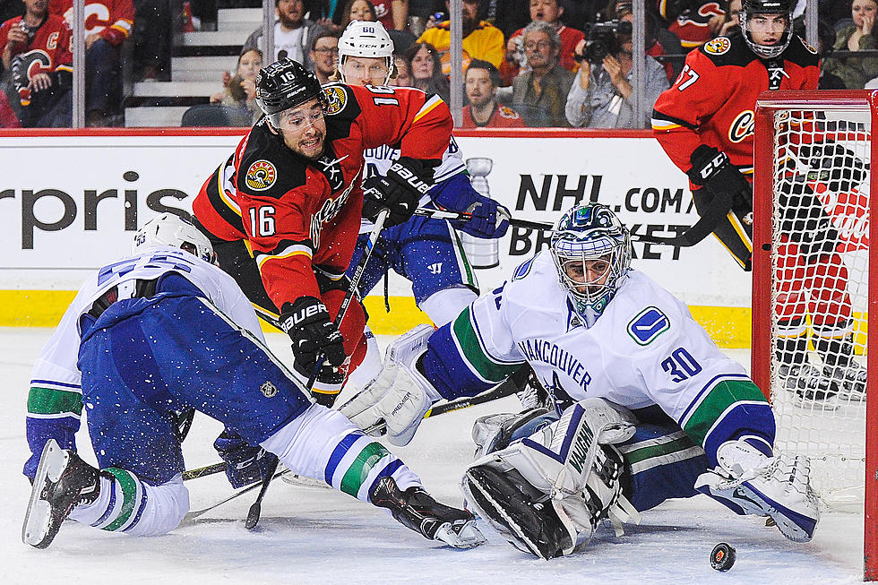 Mikael Backlund has first hat trick, Flames beat Canucks 7-3