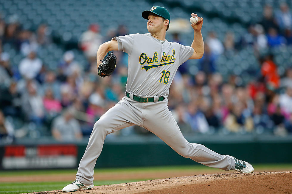 Hill wins again, A’s end skid with 5-0 victory vs Mariners; Streaking Cano Rolls