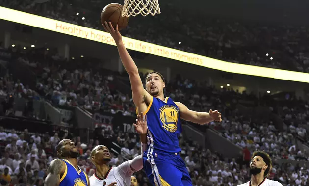 Curry Out, But Warriors Hold Off Blazers 113-111