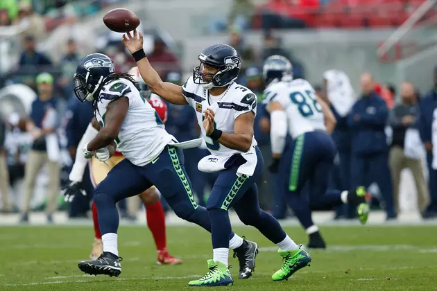 Wilson Throws For 2 TDs, Runs For Another As Seahawks Win