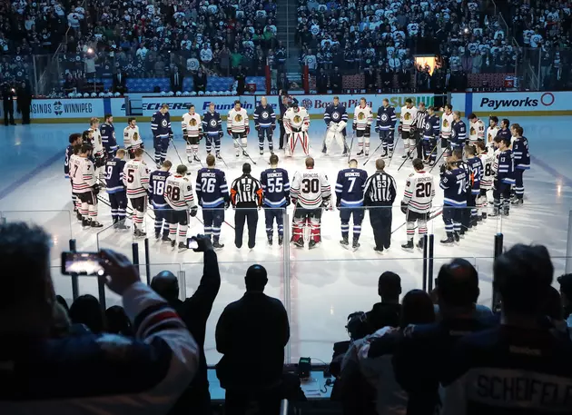 Canadians Don Hockey Jerseys to Honor Dead in Bus Crash