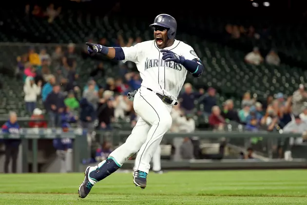 Heredia&#8217;s RBI Single in 11th Lifts Mariners Past Rangers 9-8