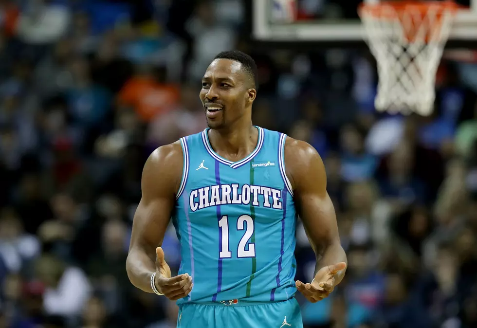 Hornets agree to trade Howard to Nets for Mozgov
