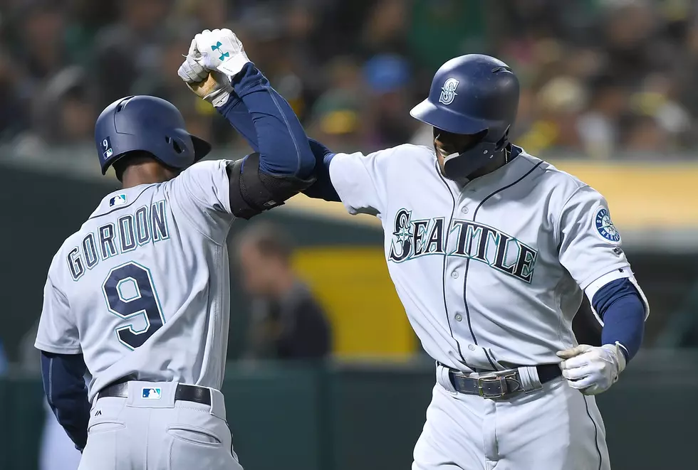 Dee Goes Deep Late, M's Top A's In 12