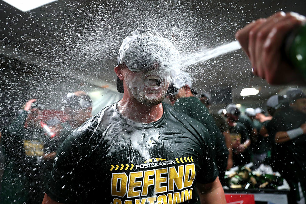 A’s Clinch Playoff Berth, Then Beat Mariners 7-3