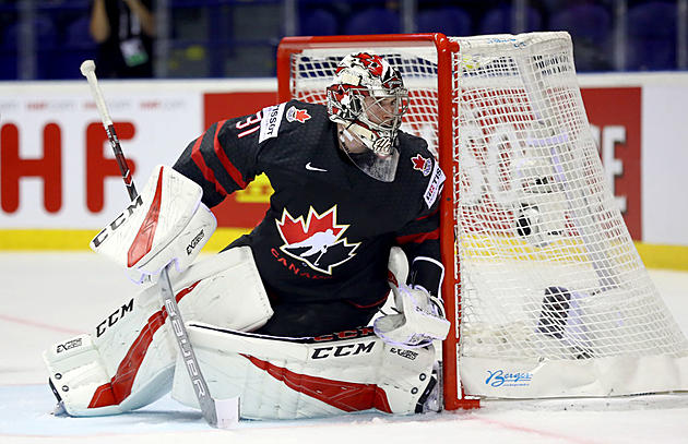 Canada Escapes; US, Sweden Fall in World Hockey