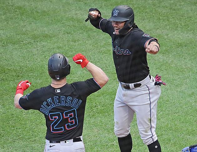 Dickerson Homers as Marlins Beat Cubs 5-1 in Playoff Opener