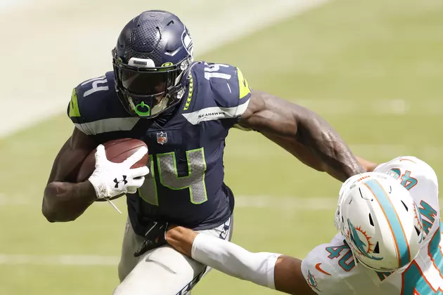 DK Metcalf Watches as Seahawks QB Competition gets Underway
