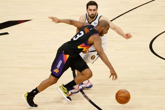 Rejuvenated Paul Leads Suns Over Nuggets 122-105 in Game 1