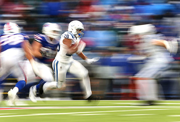 Taylor Runs up the Score With 5 TDs; Colts Beat Bills 41-15