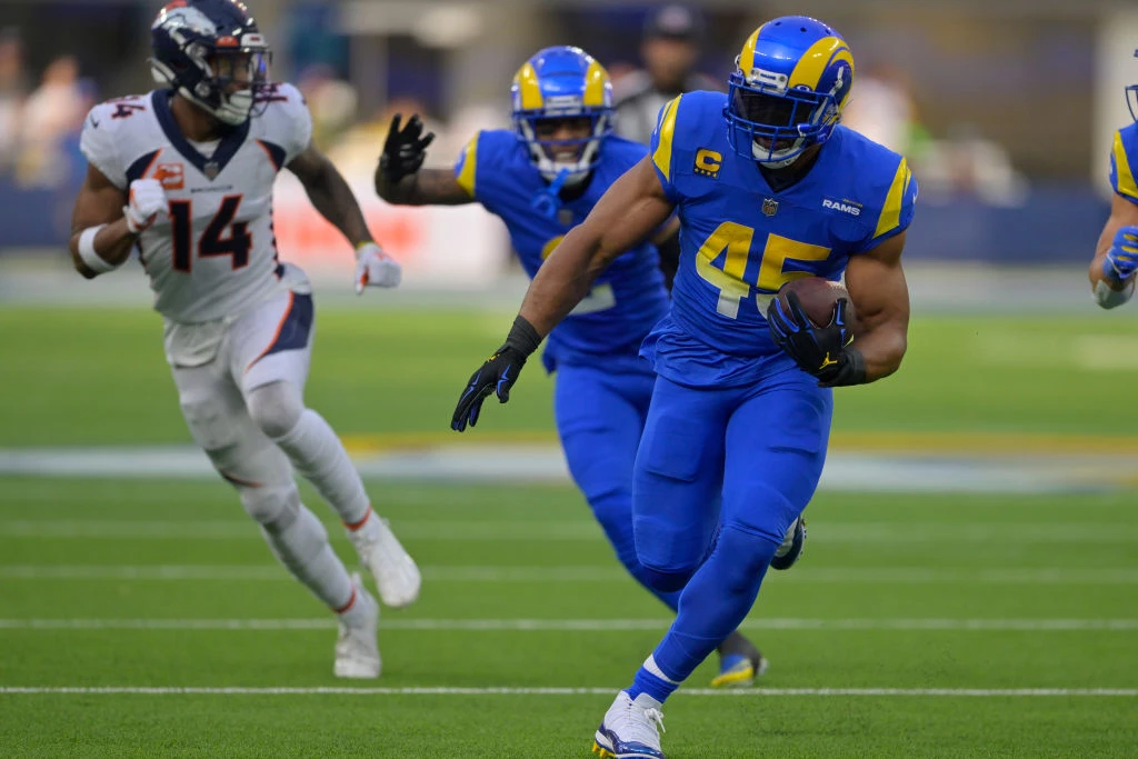 Justin Herbert Los Angeles Chargers Unsigned Powder Blue Jersey Scrambling  Photograph in 2023