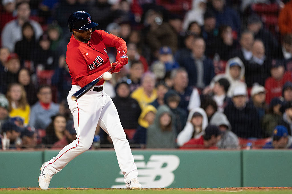 Pablo Reyes of the Boston Red Sox reacts with James Paxton of the News  Photo - Getty Images