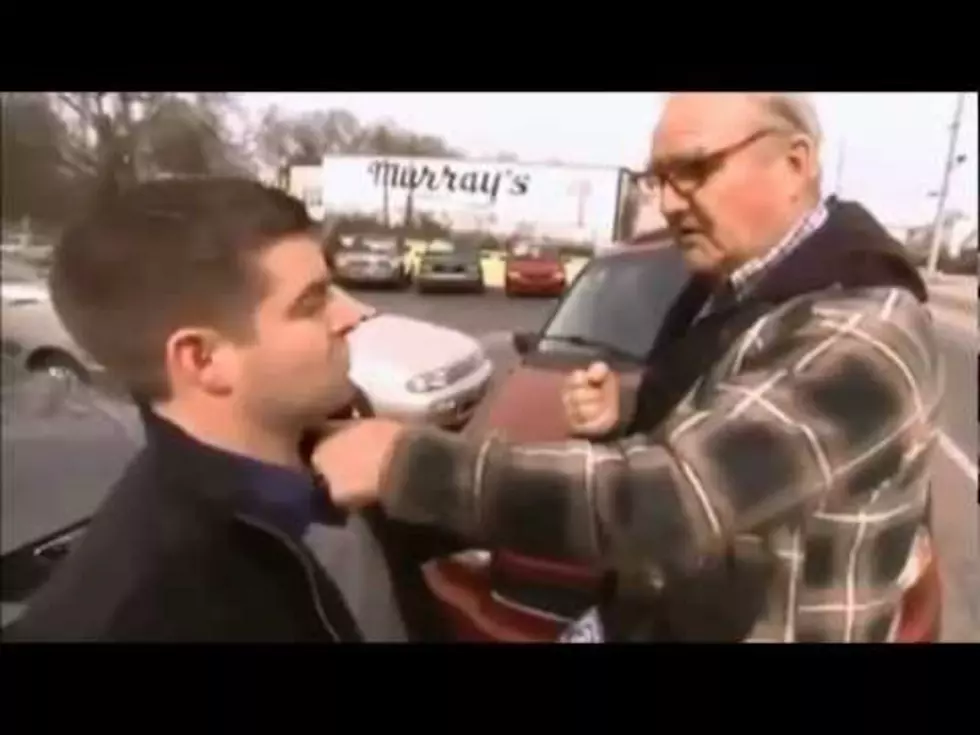 Old Guy Punches Reporter [Video]
