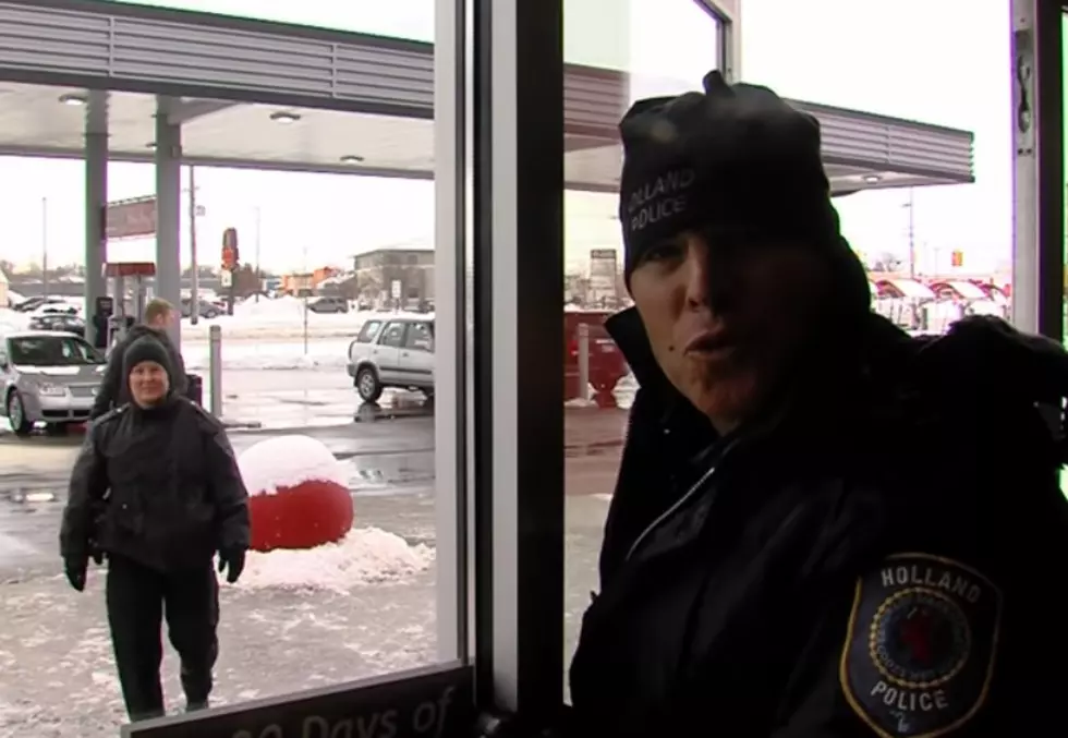 Watch Holland Police Officers Surprise Unsuspecting Drivers With Free Gas