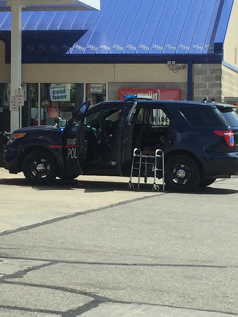 People Doing Good: GRPD Officer Caught Helping Overheated Elderly Lady