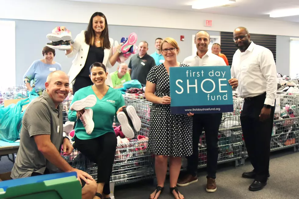 Warm &#038; Fuzzies: First Day Shoe Fund Donates over 300 pairs of shoes to Comstock Elementary