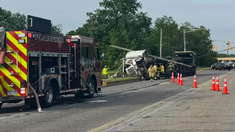 Crews Clean Up Fuel After Semi Truck Flips On West River Drive