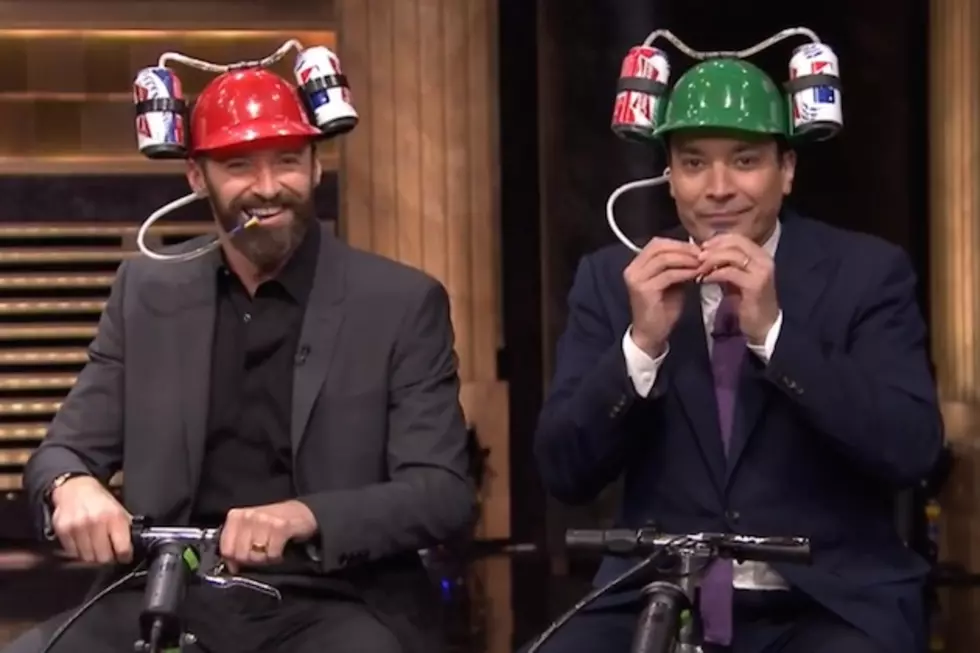 Hugh Jackman’s Cooler Scooter Race With Jimmy Fallon Is the Perfect American Pastime